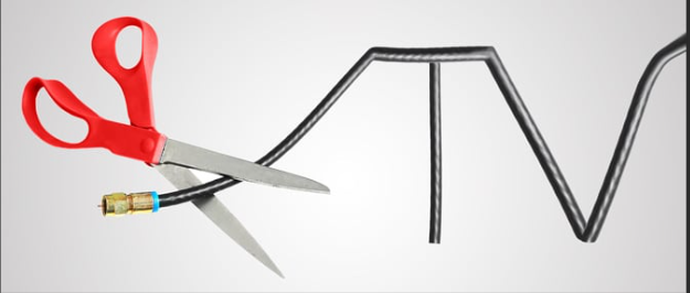image of scissors cutting a coaxial cable for cable TV.