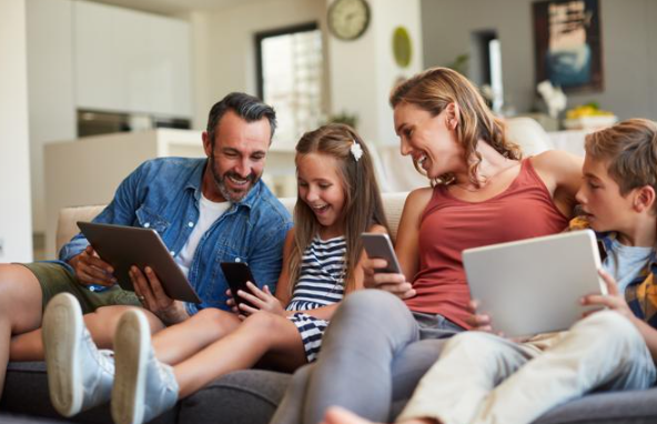 family safely enjoying their connected devices